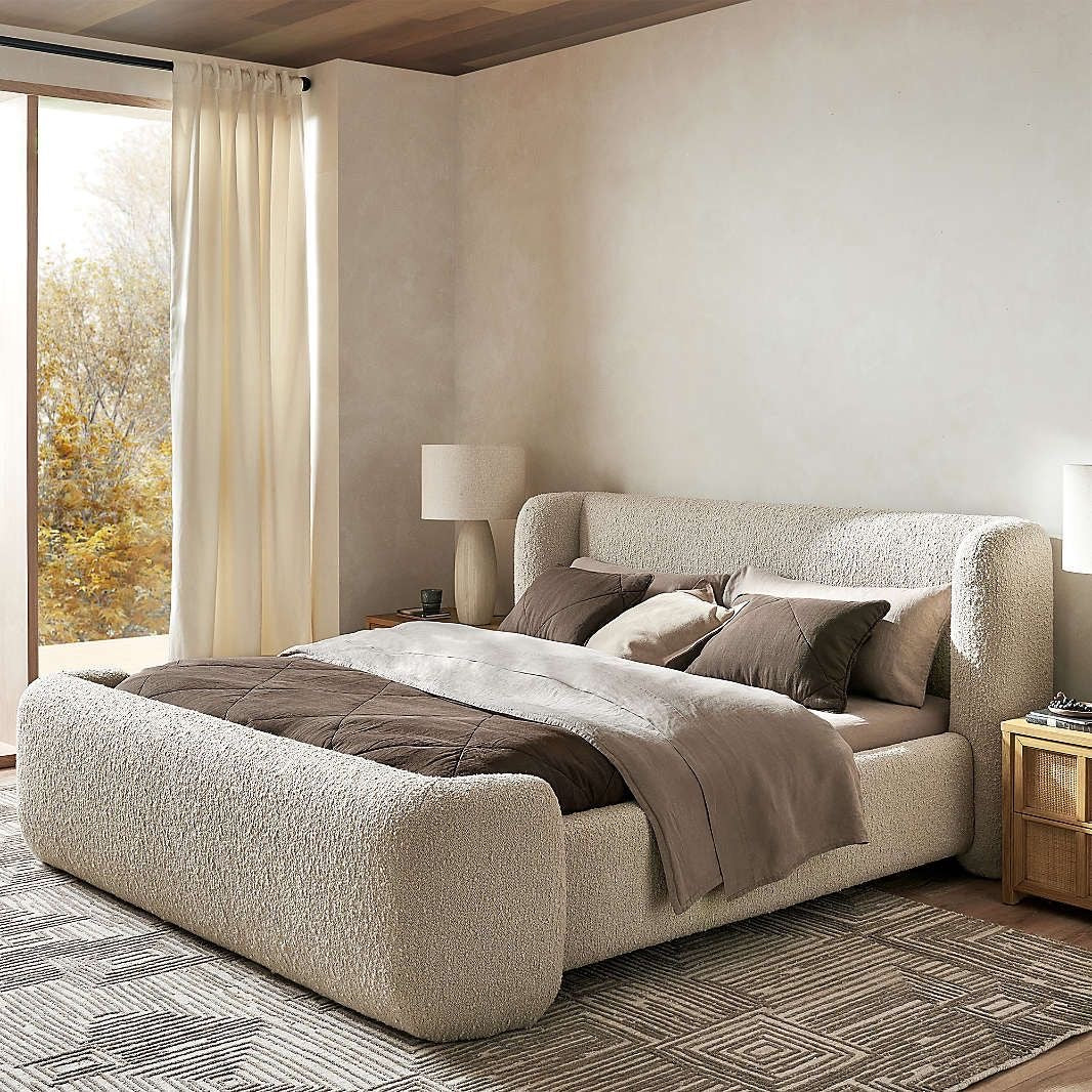 haven-wingback-cocoon-bed-in-cream-textured-boucle
luxury-upholstered-platform-bed-with-curved-wing-headboard