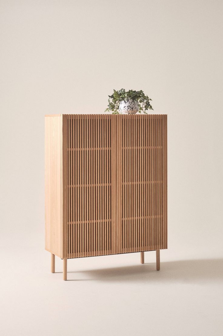 Slatted wood cabinet
