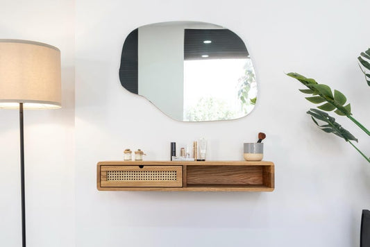 Whimsy Wall Vanity with Wooden Shelf and Irregular Mirror
Modern Minimalist Floating Vanity Table with Drawer
Compact Wall-Mounted Vanity for Bedroom or Office
Serene Vanity Setup with Lamp and Green Plant Accent