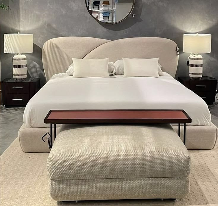 sculptural-petal-design-upholstered-headboard-ivory

modern-organic-bedroom-set-with-matching-ottoman

luxury-textured-boucle-bed-with-dark-wood-nightstands