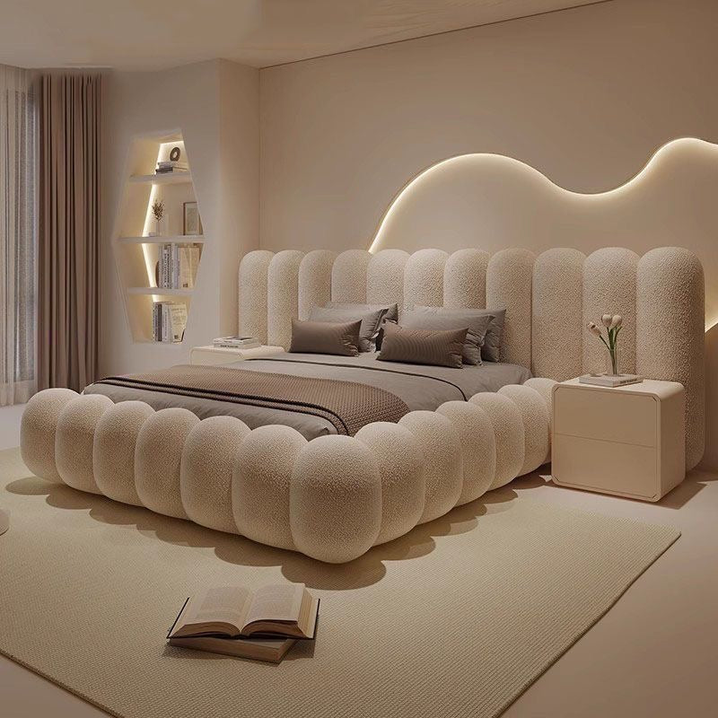 ottavia-pill-fluted-cloud-bed-cream-boucle

modern-vertical-tufted-luxury-platform-bed

designer-sculptural-master-bedroom-furniture