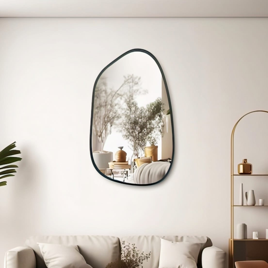 Modern asymmetric pebble shaped freeform wall mirror 30 by 20 inches for contemporary interiors.