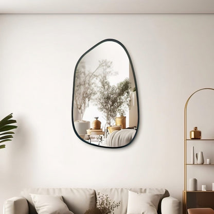 Modern asymmetric pebble shaped freeform wall mirror 30 by 20 inches for contemporary interiors.