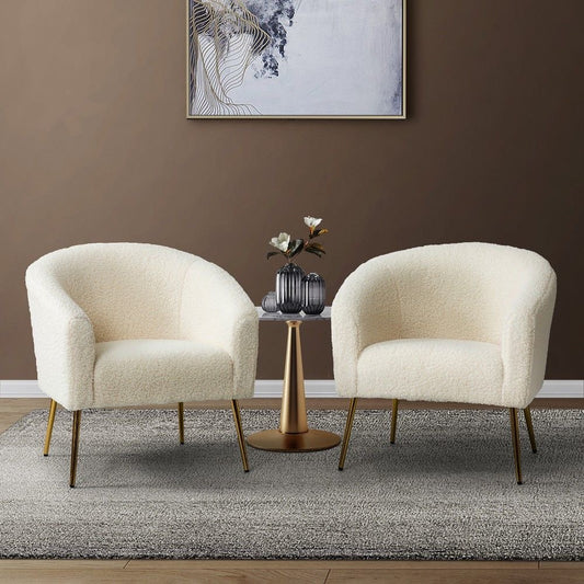 Modern barrel chair with boucle upholstery and metal legs, perfect for living rooms or lounges