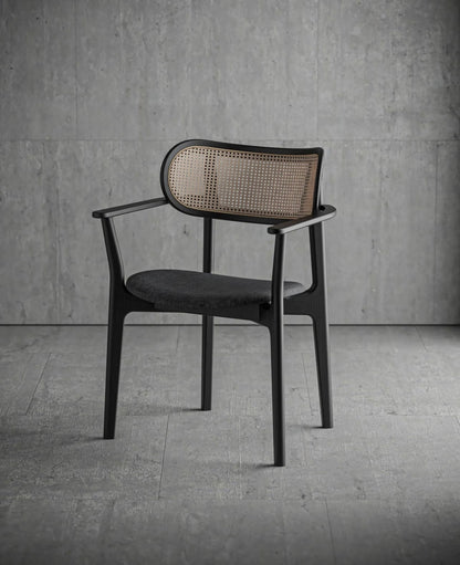 The Chloe Chair crafted from wood and rattan, combining natural texture with minimalist modern style