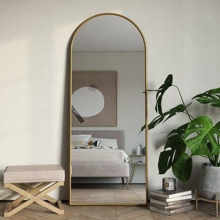 A tall full-length Leucippe Mirror with a sleek metal frame, designed for modern interiors and functional dressing spaces.